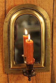 CANDLE SCONCE BY MIRROR
