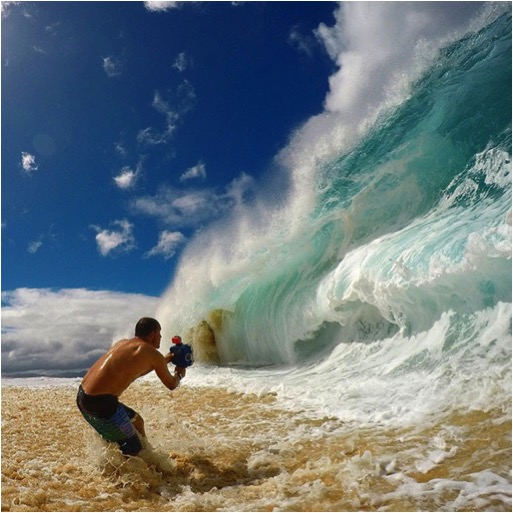 Clark Little shooting a wave in Hawaii, www.clarklittlephotography.com